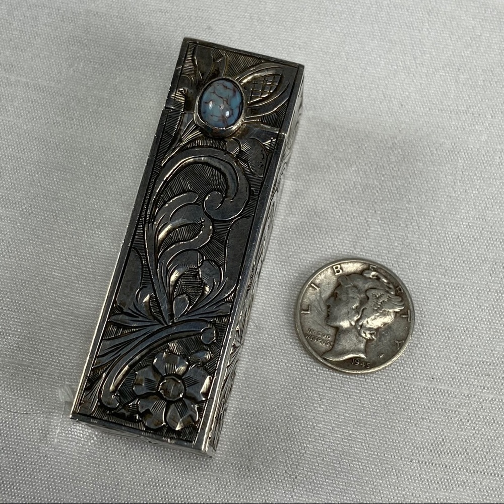 Vintage sterling lipstick holder with blue stone